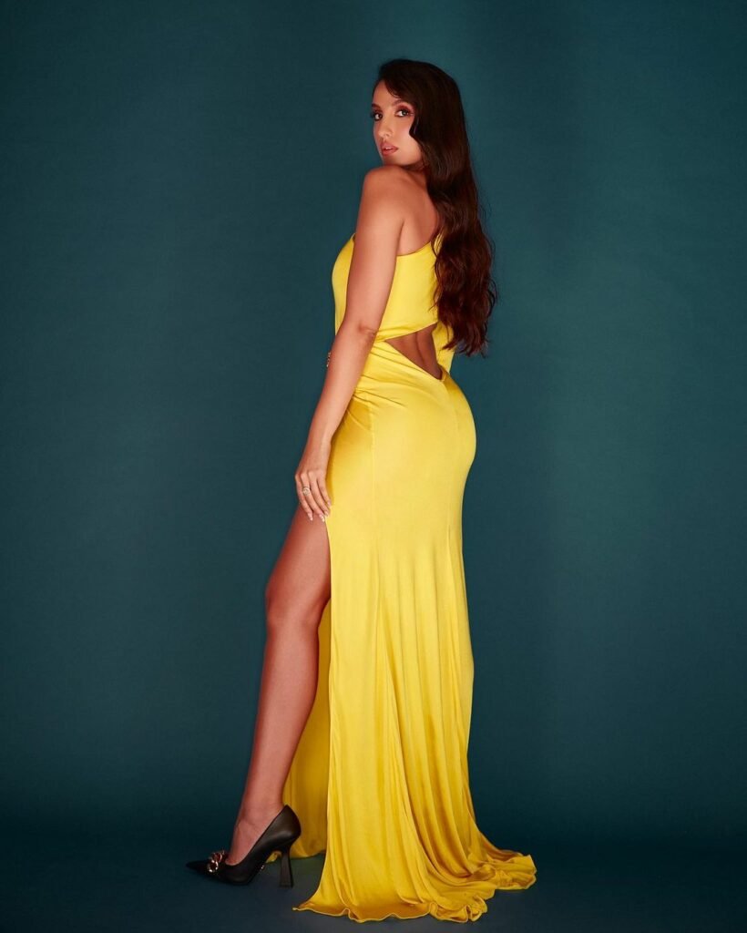 Nora Fatehi : కత్తిరించిన డ్రెస్లోనూ కత్తిలా కనిపిస్తున్న హాట్ బ్యూటీ 3 nora-fatehi-trending-glamours-cutout-yellow-dress