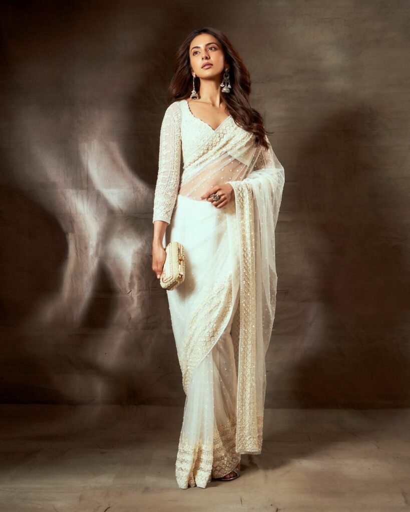 Rakul Preet Singh : తెల్లని చీర జారుతోంది సంధ్యవేళ 5 rakul-preet-singh-glamours-looks-in-white-sheer-saree