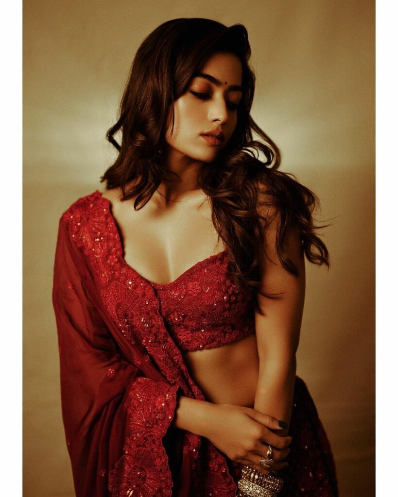 Rashmika Mandanna : రెడ్ కలర్ లెహంగాతో రెచ్చగొడుతున్న మంగళూరు బేబీ 3 rashmika-mandanna-glamours-looks-in-red-colour-lehenga-set